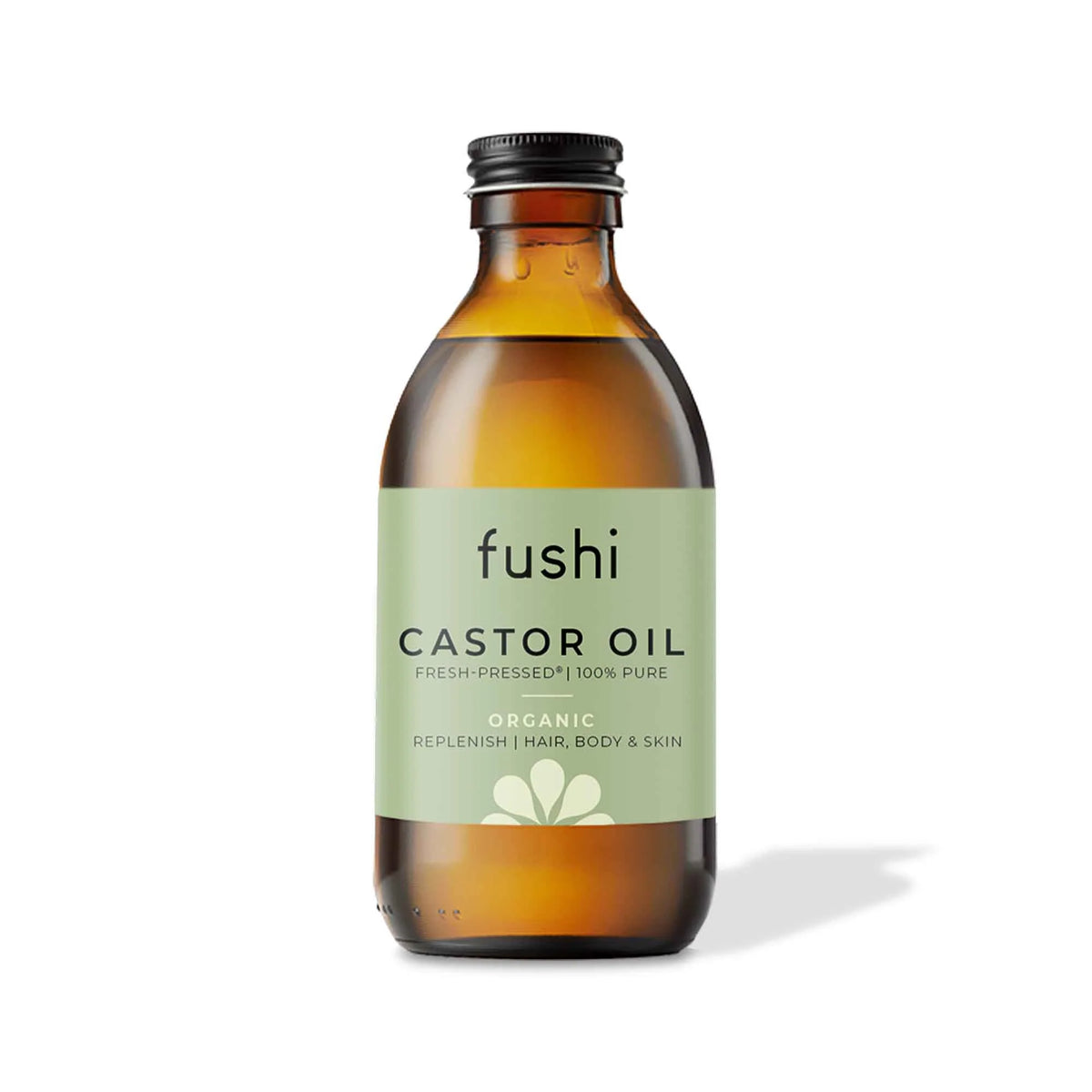 Amber glass bottle with black cap for organic castor oil, health and beauty product
