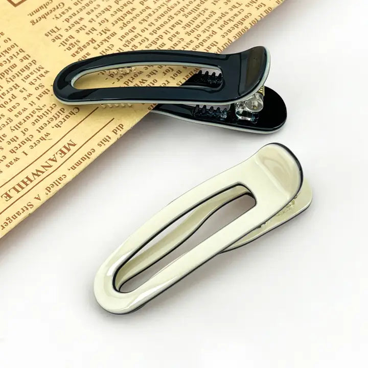 Minimalistisk acetate hårklemme til styling