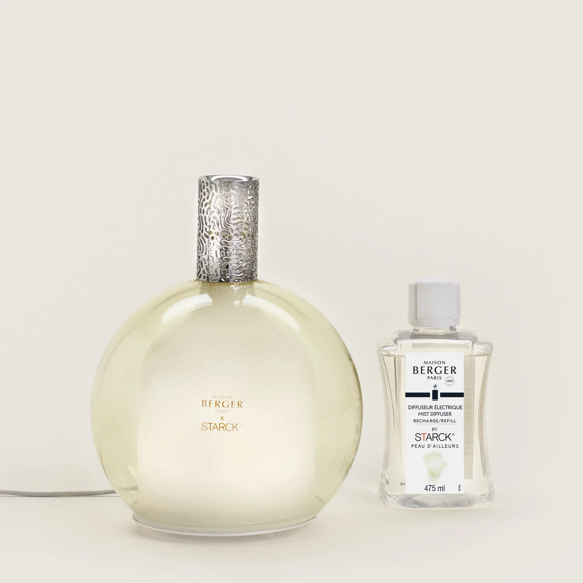 Philippe Starck Diffuser & Peau d’Ailleurs – et eksklusivt diffuser-sæt, der fylder dit hjem med friskhed, mystik og tidløs elegance inspireret af det ukendte.
