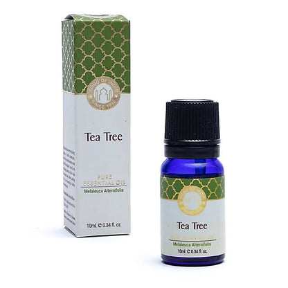 Økologisk Tea Tree æterisk olie i blå glasflaske med emballage til personlig pleje og wellness