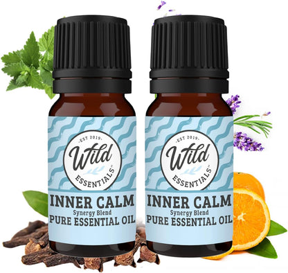 To flasker af Inner Calm æterisk olie med naturlige ingredienser og krydderurter