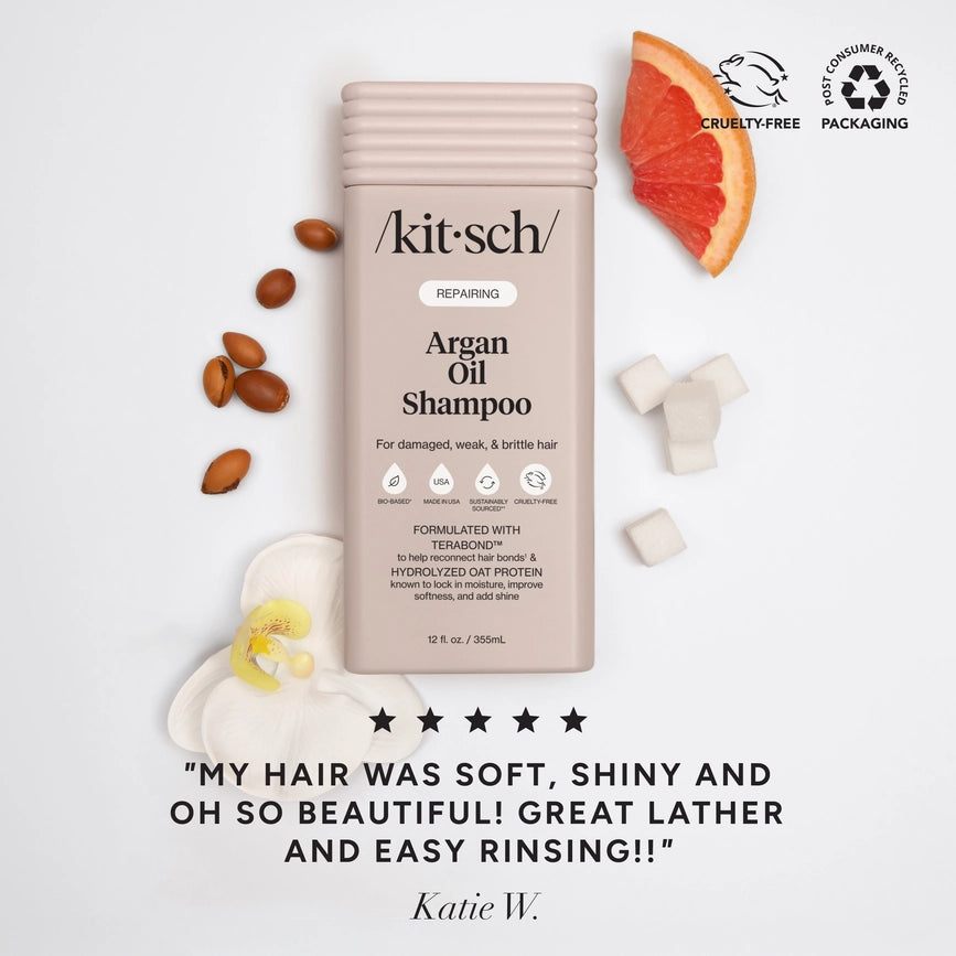 Kitsch argan olie shampoo flaske omgivet af naturlige ingredienser, cruelty free emballage