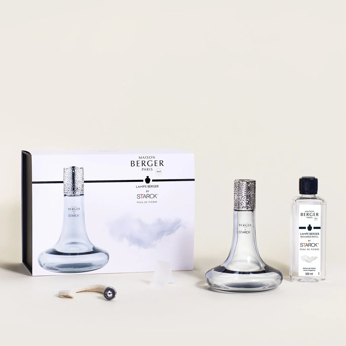 Maison Berger x Philippe Starck Peau de Pierre duftlampe – et ikonisk katalytisk duftlampe sæt, hvor laboratorieinspireret design, effektiv luftrensning og en sensuel, mineralsk duft smelter sammen
