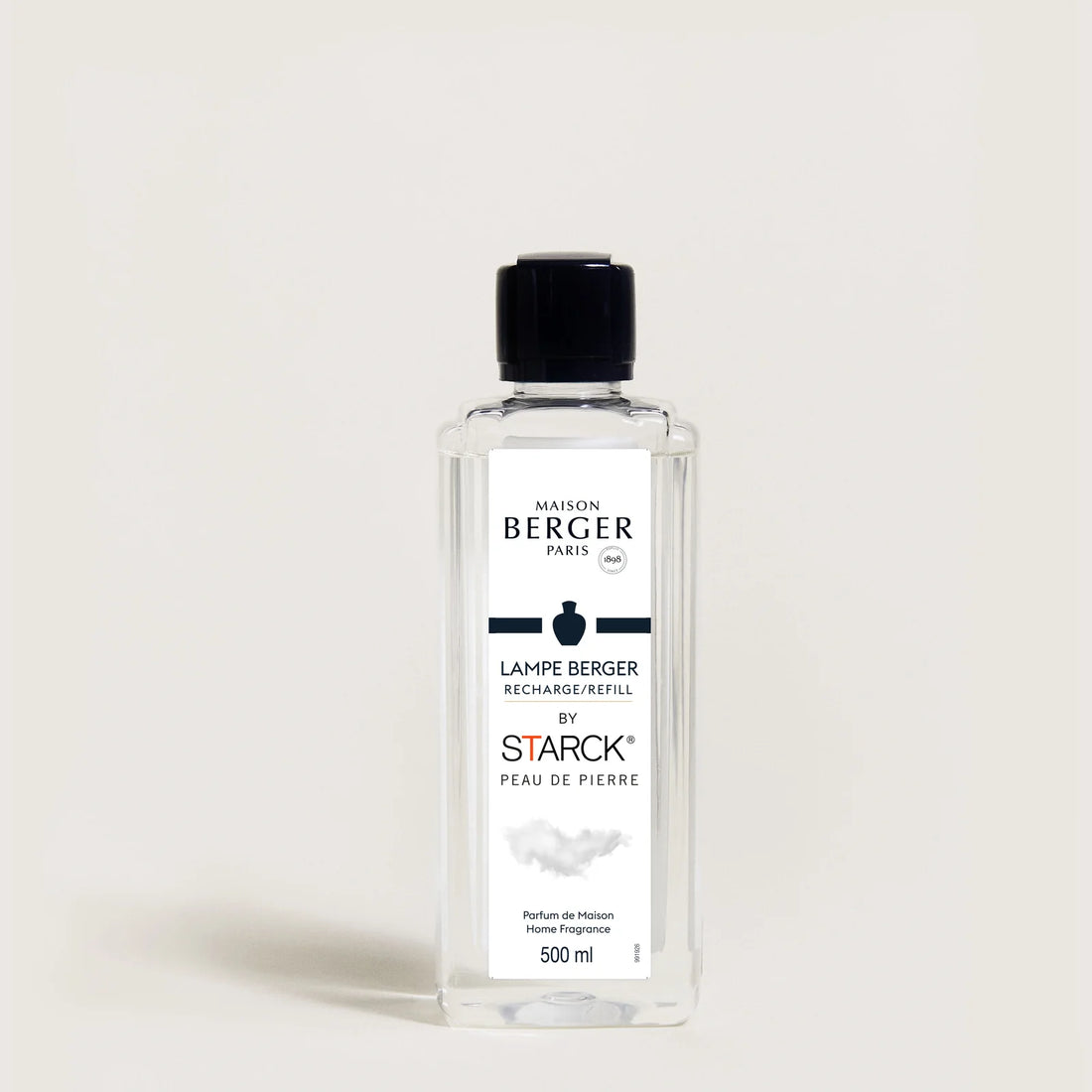 Peau de Pierre fra Maison Berger – en sofistikeret og nuanceret signaturduft, der udforsker kontrasten mellem det maskuline og feminine med varme, krydderier og trænoter.