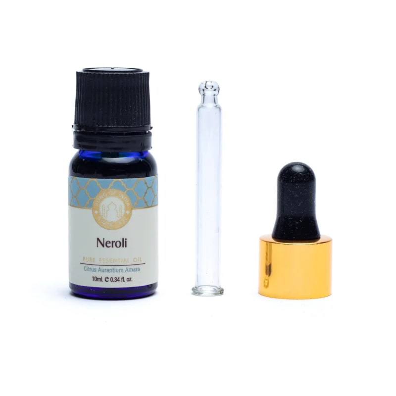 Neroli æterisk olie med dråbetænger og glasrør til aromaterapi