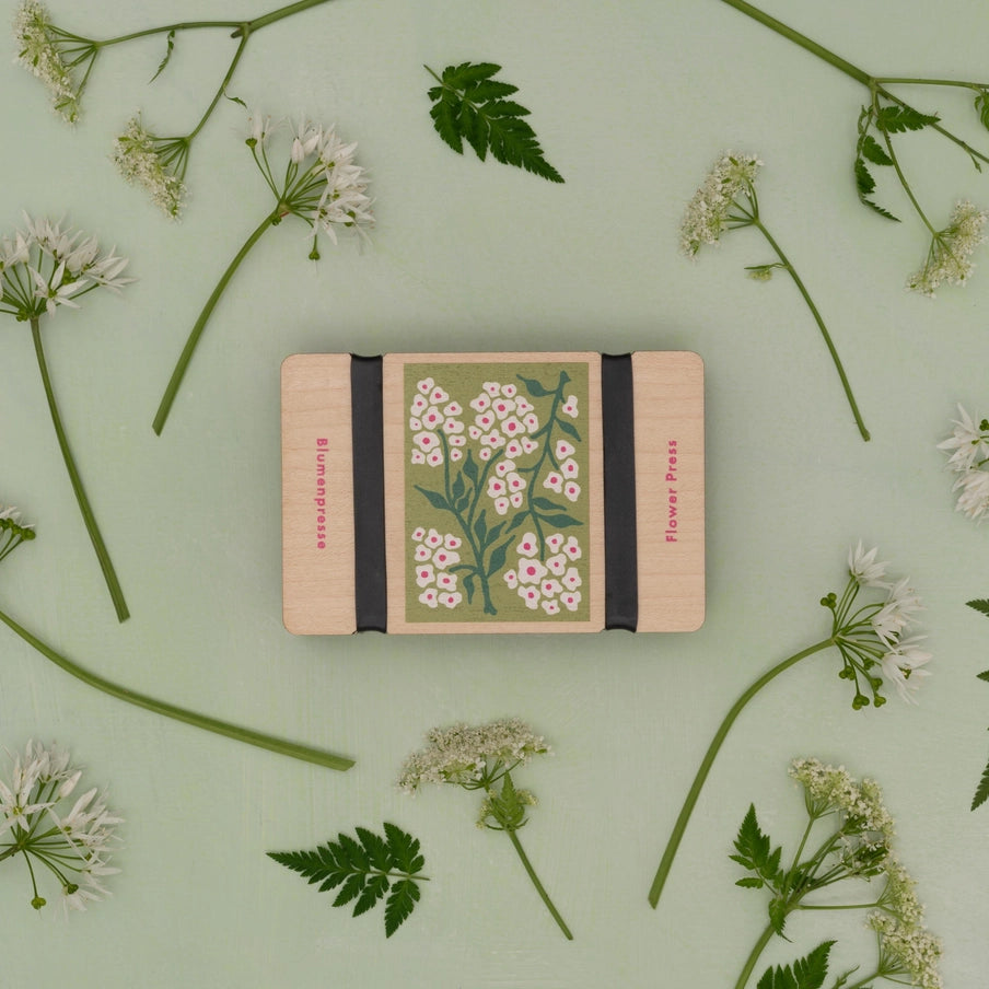 Blomsterpresser med blomster og blade, naturinspireret design til scrapbooking