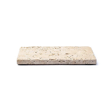 Giv dit badeværelse et elegant løft med denne travertin sæbeskål – en eksklusiv og funktionel løsning, der kombinerer klassisk charme, naturlige materialer og optimal opbevaring af dine faste sæber.