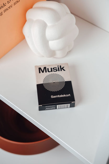 Hvidt musik samtalekort med spørgsmål om musik til dybe samtaler