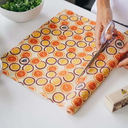 Bivoks wrap med citrusfrugt mønster til madopbevaring og bæredygtig livsstil